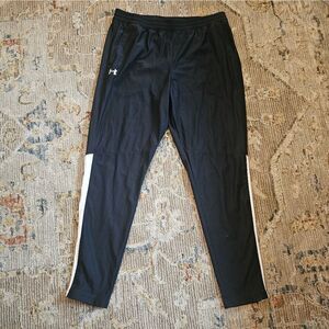 NWT Under ARMOR Twister, Fitted Pant Sz Xl. Polyester And Ankle Zippers. Has 32"